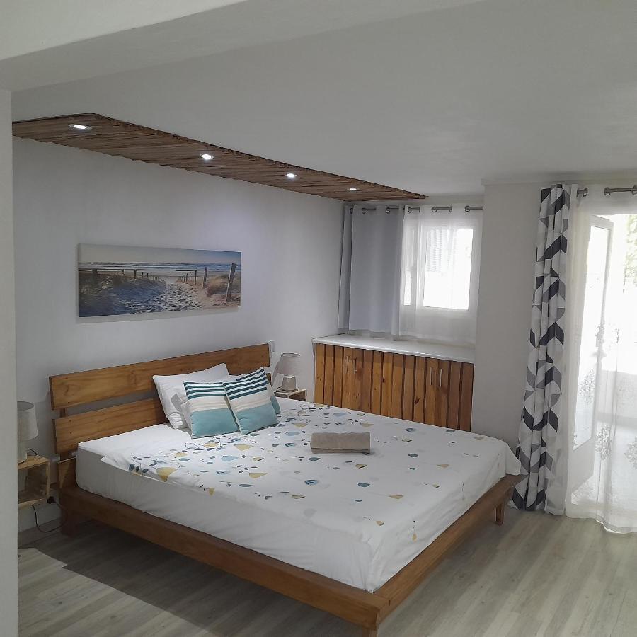 תמרין Holiday Surf Lodge מראה חיצוני תמונה
